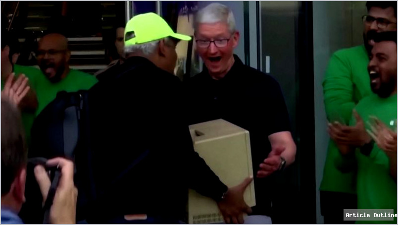 Tim Cook at Apple Store Mumbai opening with original Macintosh