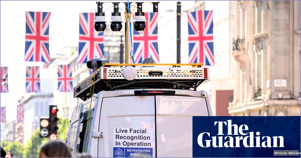 A police officer monitoring facial recognition software on a computer screen